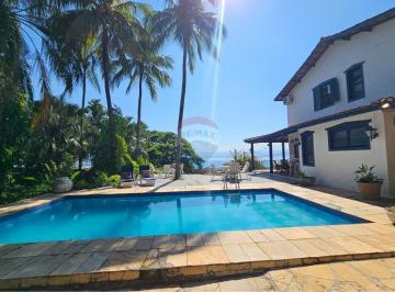 Casa · 345m² · 5 Quartos · 4 Vagas · Casa dos Sonhos em Ilhabela: Sofisticação à Venda