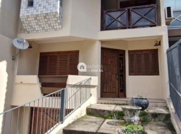 Casa · 214m² · 4 Quartos · 3 Vagas · Residência de com 214m², Lareira e Amplo Pátio – Conforto e Estilo