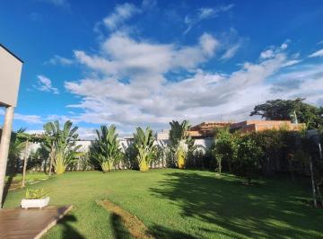 Foto 01 · Casa em condomínio de luxo com 3 suítes e um quintal amplo com pomar, horta e um Spa maravilhoso