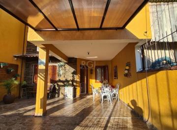 Casa · 125m² · 4 Quartos · 2 Vagas · Casa no bairro Hípica - 4 dormitórios