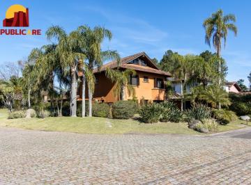 Casa · 385m² · 6 Quartos · 5 Vagas · Casa à venda no Terra Ville com 6 dormitórios e fundo para o lago.