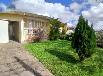 Casa · 110m² · 3 Quartos · 3 Vagas · Ampla casa com patio no bairro Rubem Berta .