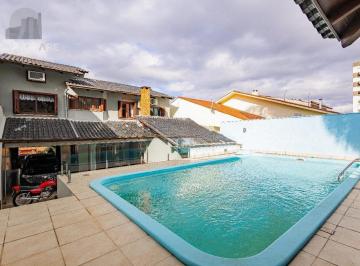Casa · 208m² · 4 Quartos · 3 Vagas · Casa de 4 dormitórios e 208m² à venda no Bairro Jardim Botânico, Porto Alegre.