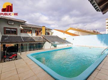 Casa · 208m² · 4 Quartos · 3 Vagas · Casa de 4 dormitórios e 208m² à venda no Bairro Jardim Botânico, Porto Alegre.