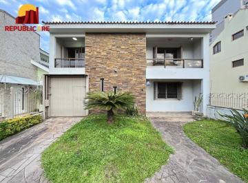 Casa · 385m² · 5 Quartos · 3 Vagas · Casa semimobiliada com 5 dormitórios, piscina e 3 vagas no Camaquã Porto Alegre