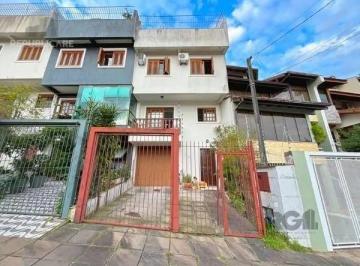 .jpg+2025-03-04 · Casa em Porto Alegre, no bairro Ipanema, com 3 dormitório(s), e 3 banheiros, à v