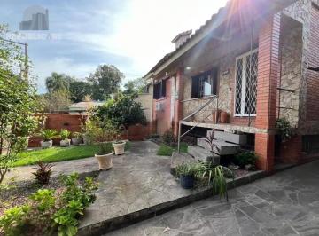 Casa · 320m² · 4 Quartos · 2 Vagas · Casa com 4 quartos e 2 lareiras no bairro Belém Velho