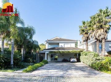 Casa · 458m² · 5 Quartos · 4 Vagas · Casa no Condomínio Las Rocas, vista para o Guaíba, com 5 suítes