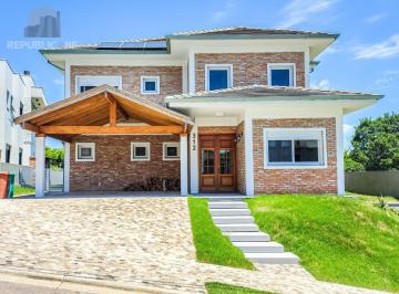 Casa · 305m² · 4 Quartos · 2 Vagas · Casa mobiliada em condomínio Alphaville com 4 suítes, área verde nos fundos e pi