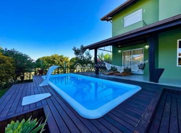 Casa · 214m² · 4 Quartos · Casa em Condomínio Fechado no Campeche - 4 Quartos com Piscina e Alta Rentabilidade no Airbnb