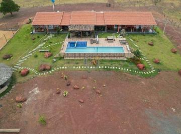 Vista aérea da sede cinematográfica: projeto moderno com integração total e lazer completo no coração do Araguaia. · Fazenda 315 Alqs em São Miguel do Araguaia | Pecuária Elite