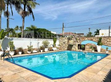 a533ad9fa0c7a2395606e09764089f6d7af2cb2f · Casa no Guarujá, Praia da Enseada, 3 Quartos, sendo Suítes, Área Gourmet com Piscina e Churrasqueira