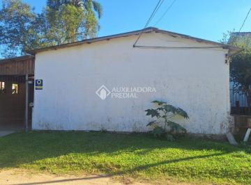 Casa · 150m² · 3 Quartos · 2 Vagas · Casa Ampla com Duas Moradias, Pátio Espaçoso e Potencial Comercial