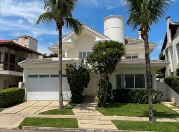 Casa · 271m² · 5 Quartos · 2 Vagas · Luxo em Jurerê Internacional: Mansão com 5 Dormitórios (3 Suítes), Hidro e Lazer Completo