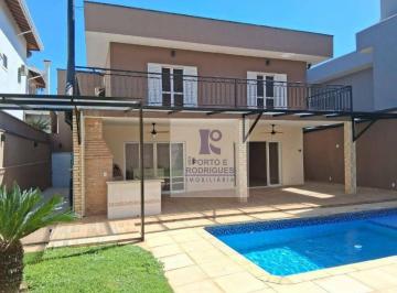 69976c1a2365c57b3e8b2c620f41b857c3aa953c · Linda casa com 4 dormitórios em condomínio fechado