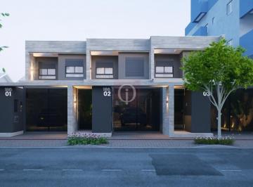 Foto 01 · Sobrados novos com design moderno, conforto e acabamento impecável no bairro Iririu em Joinville/SC.