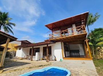 Casa · 100m² · 3 Quartos · 3 Vagas · Refúgio Moderno em Cocaia: Casa com Piscina e Jardim
