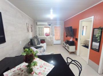 Photo 1 · Casa de 2 dormitório á venda no bairro Mato Grande/ Canoas.