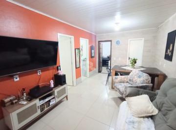 Photo 1 · Casa de 2 dormitório á venda no bairro Mato Grande/ Canoas.