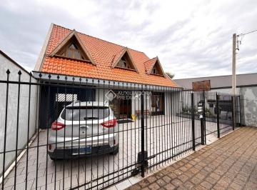 Comercial · 385m² · 2 Vagas · Loja e casa comercial à venda no bairro Novo Mundo, próximo ao Supermercado Jacomar e ao Colégio SES