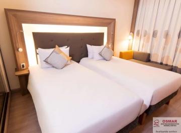 Foto 01 · Apartamento comercial à venda em Santos-SP, no Gonzaga: 1 quarto, 1 suíte, 1 banheiro, 55m² de área!