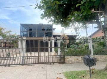Casa · 358m² · 6 Quartos · 4 Vagas · Casa na Praia Grande em Torres RS