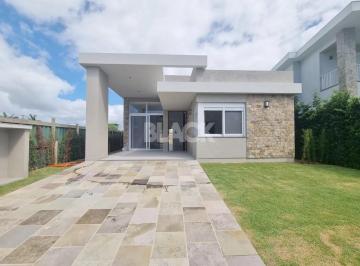 Casa · 180m² · 4 Quartos · 2 Vagas · Casa térrea com 04 suítes no Condomínio Ilhas Park em Torres RS