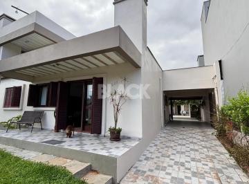 Casa · 280m² · 4 Quartos · 3 Vagas · Ampla residência na Praia da Cal em Torres RS