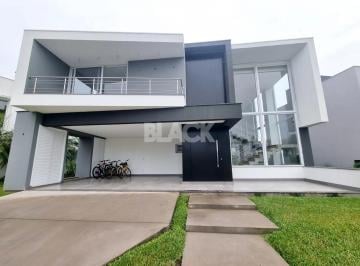 Casa · 357m² · 5 Quartos · 2 Vagas · Casa com 5 suítes no Ocean Side em Torres RS