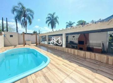 Casa · 235m² · 3 Quartos · 3 Vagas · Casa a 250m da praia à venda no Jardim Indaiá em Bertioga/SP