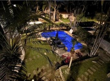 Casa · 480m² · 4 Quartos · 5 Vagas · Casa de Alto Padrão no Park Imperial - Condomínio Fechado na Praia | Oportunidade Exclusiva