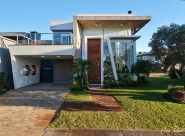 Casa · 220m² · 4 Quartos · Casa à venda em Condomínio- Capão da Canoa/RS