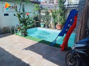 Casa · 107m² · 3 Quartos · 2 Vagas · Casa com piscina sendo 3 dormitórios, 2 suítes à venda, 107 m² por R$ 650.000 - Tupi - Praia Grande/