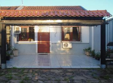 Casa · 70m² · 2 Quartos · 2 Vagas · Casa de 2 dormitórios em excelente estado com espaço gourmet! Valor abaixo do mercado!