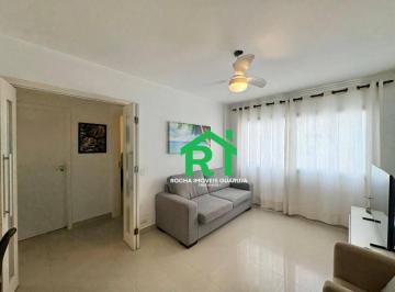Sala · Apartamento à beira mar com 2 quartos (1 suíte), 1 vaga à venda em Pitangueiras, Guarujá