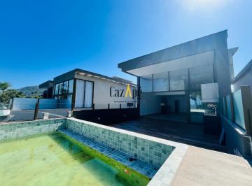 Foto 02 · Casa Frente Mar de Luxo à Venda no Litoral Norte de SP | 5 Suítes, Piscina Privativa e Vista Livre