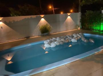 Casa · 140m² · 2 Quartos · 3 Vagas · 
                                Casa a venda em Arroio do Sal com piscina 
                        
