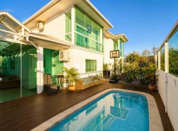 Casa · 328m² · 4 Quartos · 6 Vagas · Residência de Alto Padrão com Piscina e 4 Suítes na Pedra Branca