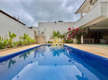 6284c2db8158261c284ac44df3d0e3bc7f352ce8 · Casa com 4 suítes, piscina e churrasqueira na Praia da Enseada – Alfa Imóveis Guarujá