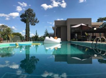 Foto 34 · Imponente casa de 4 quartos no Park Way, Brasília-DF: 3 salas, 4 banheiros, 5 vagas e 630m² de luxo!