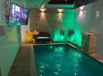 Casa · 250m² · 3 Quartos · 2 Vagas · Casa porteira fechada com piscina aquecida suite master e muito mais - Ponta da praia - Santos/SP