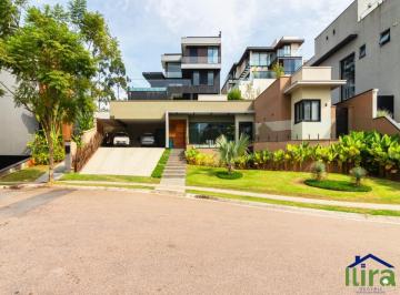 v4381a.jpg · Casa à venda com 5 dormitórios, sendo 3 suítes, com piscina e 6 vagas de garagem no Residencial Itah