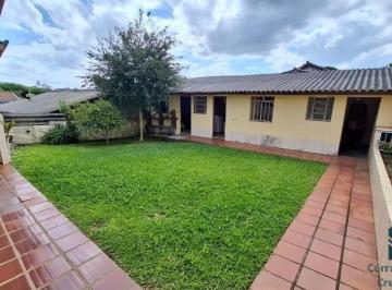 Foto 01 · Terreno com casa a venda no Santa Cândida em Curitiba - PR