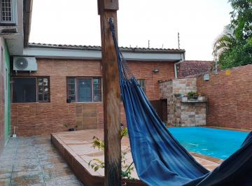 Casa de 4 quartos, Itanhaém · Casa terrea, ar condicionado, placa solar, portao automático e piscina