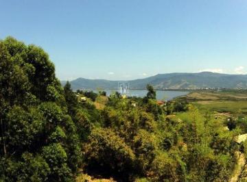Foto 01 · Terreno 3.013m² à venda em Garopaba/SC na Praia da Ferrugem com vista para lagoa