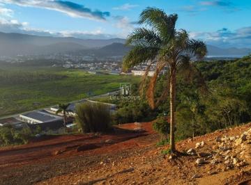 Foto 01 · TTerrenos à venda em Garopaba/SC no Condomínio Pôr do Sol com vista para lagoa