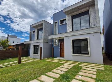 Foto 06 · Casas modernas com terraço e vista mar à venda em Garopaba/SC com 3 unidades