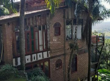 Foto 01 · Casa rústica à venda em Garopaba/SC na Encantada com 3 suítes e terreno de 2.000m²