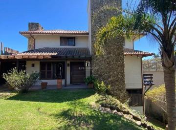 Foto 01 · Casa à Venda em Imbituba em Ibiraquera – 3 Dormitórios com Vista para a Lagoa e Piscina