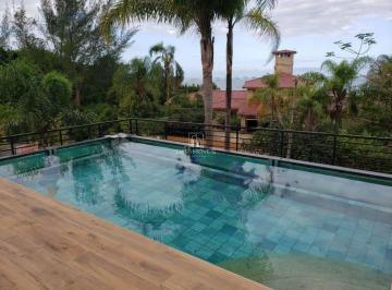 Foto 01 · Casa de Alto Padrão em Garopaba no Condomínio Terrazzas al Sole – 4 Suítes com Vista para o Mar